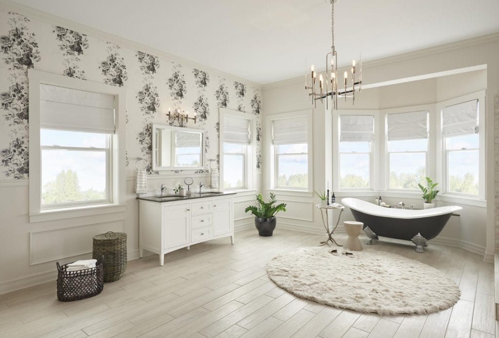 Paradigm’s double hung windows in a renovated bathroom with a clawfoot tub